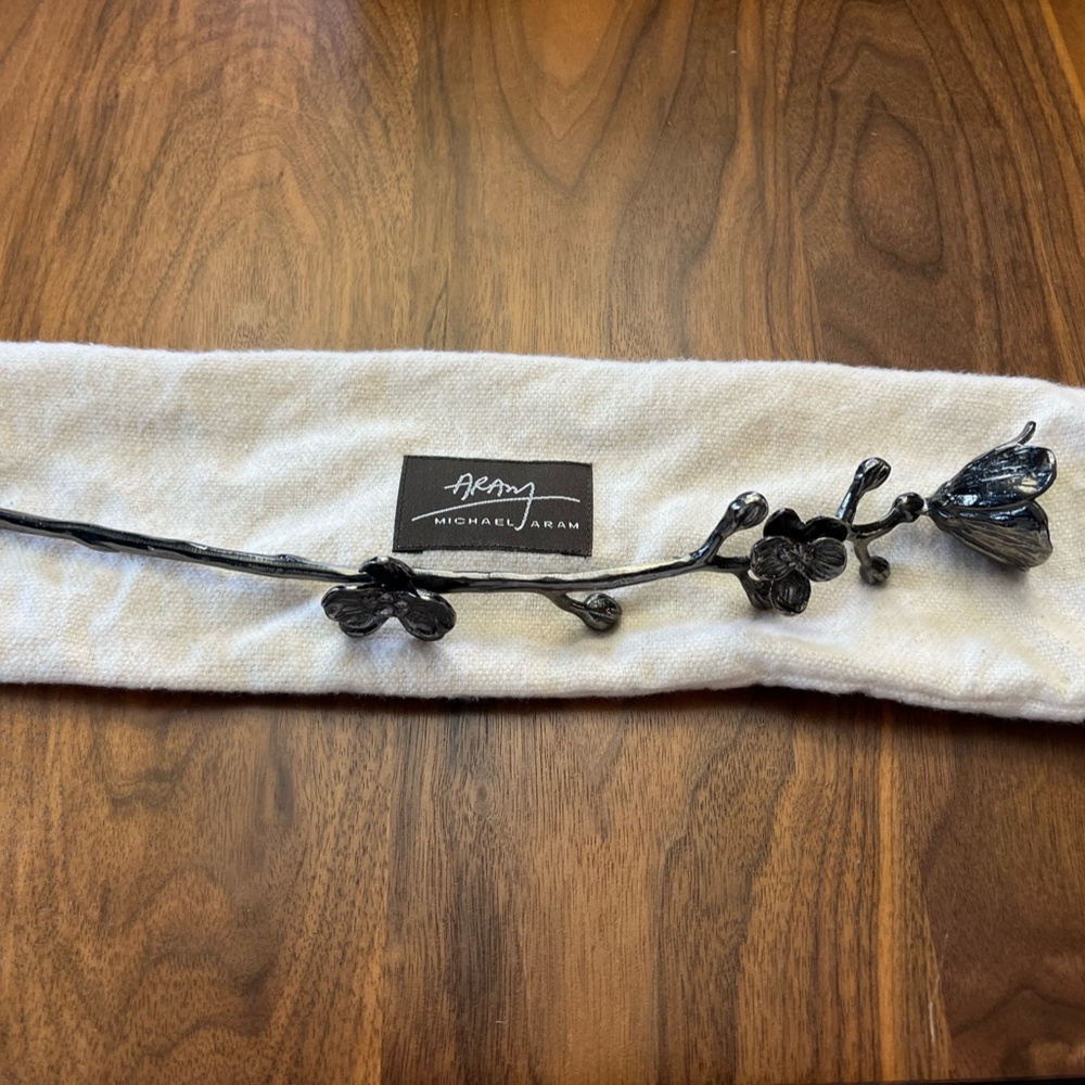 Michael Adam flower candle snuffer